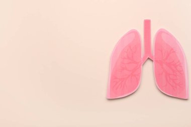 Bej arka planda pembe kağıt ciğerler