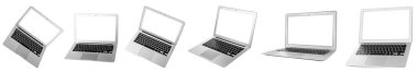 Set of modern laptops on white background