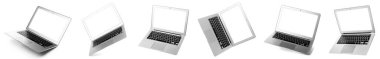 Set of modern laptops on white background