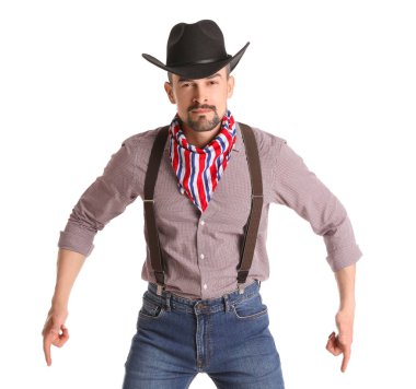 Beyaz arka planda yakışıklı kovboy