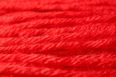 Arkaplan olarak kırmızı yün ipliklerinin yakın görünümü