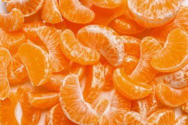 Arka plan olarak soyulmuş tatlı mandalinaların dokusu