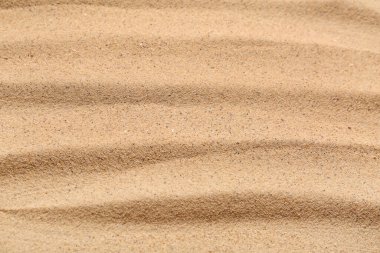 Arkaplan olarak çizgileri olan bej rengi kumsal dokusu, yakın plan