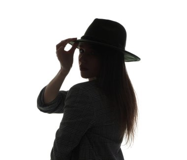 Beyaz arka planda şapkalı genç bir kadının silueti.