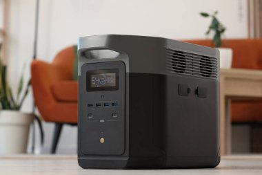 Portable power station on floor in living room