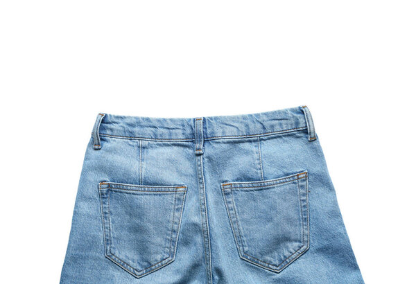 Stylish blue jeans on white background, closeup