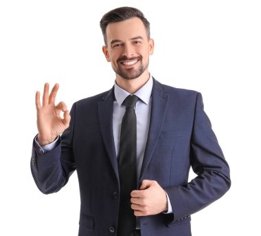 Yakışıklı işadamı beyaz arka plan ok gösteren