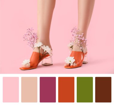 Pembe arka planda çiçekli topuklu sandaletler giyen kadın bacakları.