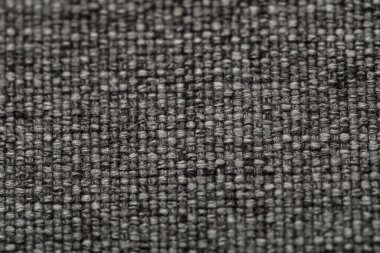 Koyu gri kumaşın dokusu, yakın plan.