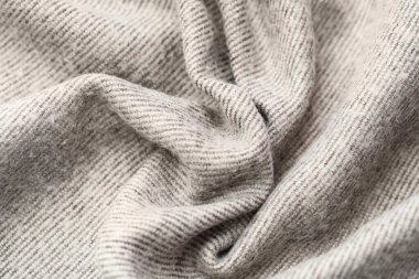 Arkaplan olarak gri yün kumaşın dokusu, yakın plan
