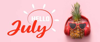 Fresh pineapple with sunglasses and headphones on pink background