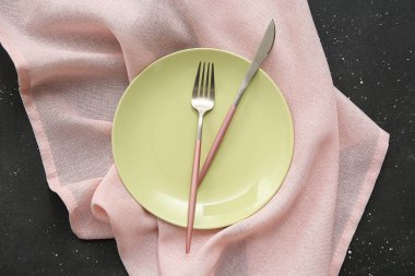 Beautiful table setting on black background