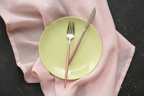 Beautiful table setting on black background