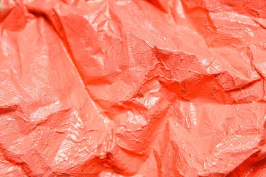 Arka plan olarak mercan yağının dokusu, yakın plan.