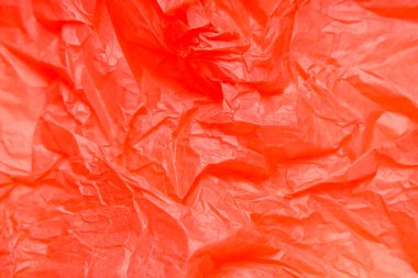 Arkaplan olarak buruşmuş mercan kağıdının dokusu, yakın plan