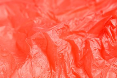 Arkaplan olarak buruşmuş mercan kağıdının dokusu, yakın plan