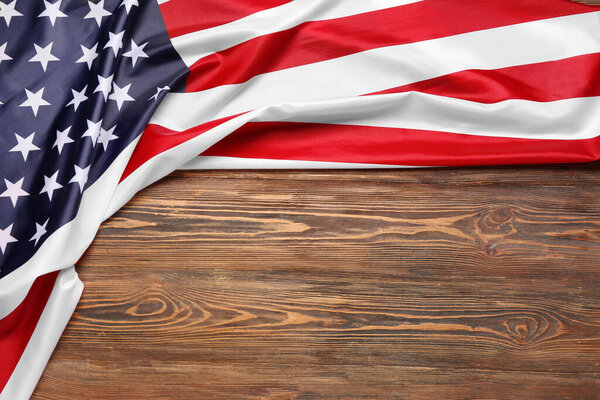 National flag of USA on wooden background. Independence Day celebration
