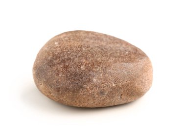 Beyaz zemin üzerinde kahverengi çakıl taşı