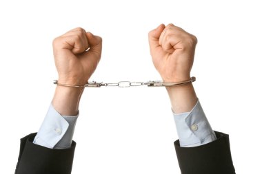 Beyaz arka planda izole edilmiş kelepçeli iş adamı elleri