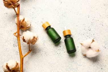 Hafif arkaplanda gerekli yağ ve pamuk dalları