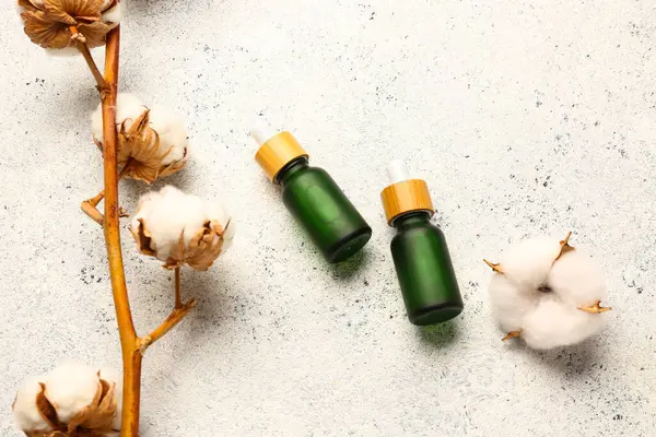 Hafif arkaplanda gerekli yağ ve pamuk dalları