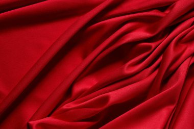 Arkaplanı kıvrımlı güzel kırmızı kadife perde