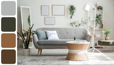 Beyaz tuğla duvarlı gri kanepeli, masalı ve çerçeveli aydınlık oturma odasının içi. Farklı renk desenleri