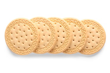 Beyaz arka planda bir sürü tatlı kurabiye