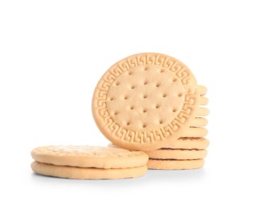 Beyaz arka planda bir sürü tatlı kurabiye