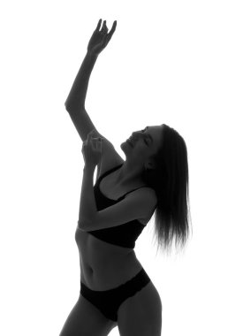 Beyaz arka planda iç çamaşırı genç kadının silueti