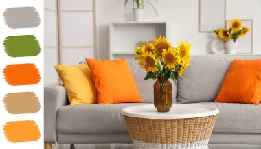 Oturma odasındaki gri kanepenin yanındaki masada vazo ve ayçiçekleri. Farklı renk desenleri