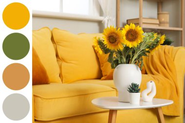 Oturma odasındaki sarı kanepenin yanındaki masada ayçiçekli vazo. Farklı renk desenleri