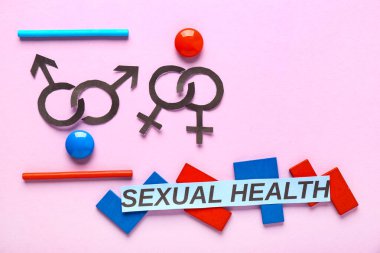 Leylak arkaplan üzerinde erkek ve kadın sembolleri olan metin cinsiyeti