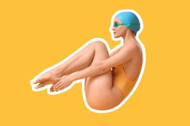 Kadın yüzücü sarı arka planda takla atıyor