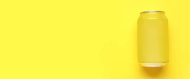 Sarı arka planda bir kutu soda ve mesaj için yer var. Tasarım için model