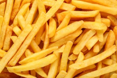 Arka plan olarak lezzetli patates kızartması dokusu.