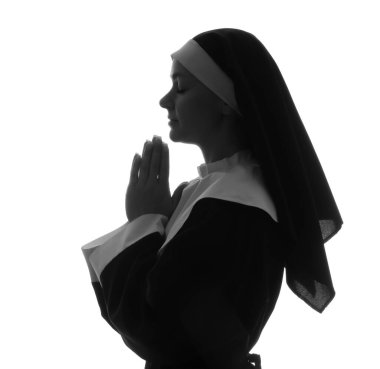 Beyaz arka planda dua eden rahibenin silueti