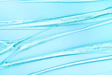 Mavi arka planda salyangoz sümüğü dokusu