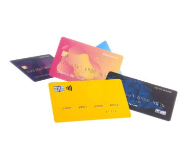 Beyaz arka planda bir sürü kredi kartı uçurmak