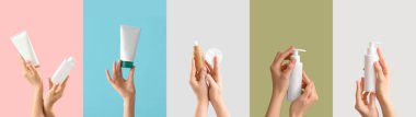 Renk arkaplanında cilt bakımı kozmetik ürünleri olan eller