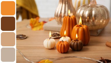 Balkabağı şeklinde mumlar yakmak, sonbahar yaprakları ve evdeki sehpanın üzerinde kuru turkuazlar, yakın çekim.