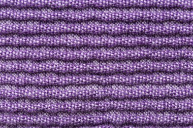 Violet arka plan olarak desenli kumaş ördü, yakın plan