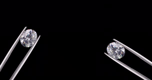 ブラックを背景にジュエリーピンセットでダイヤモンド — ストック動画