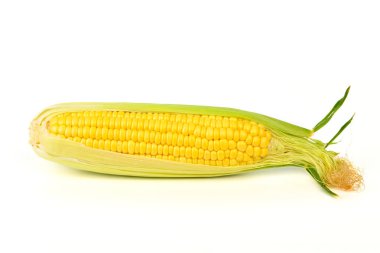 A yellow corn cob with green leaves. The corn is fresh and ready to be eaten. Concept of abundance and health, as corn is a nutritious and versatile food