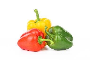 Three peppers are sitting on a white background. The peppers are of different colors, with one being red, one being yellow, and one being green