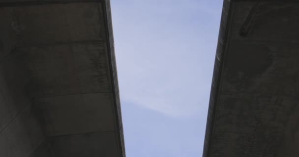 Highway Bridge Underpass Structure Concrete Columns Blue Sky Background Sunlight — Stock Video