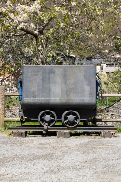 stock image Mine trolley cart wagon on tracks transportation for coal mining in Asturias province of Spain, Tormaleo on a sunny bright spring day.