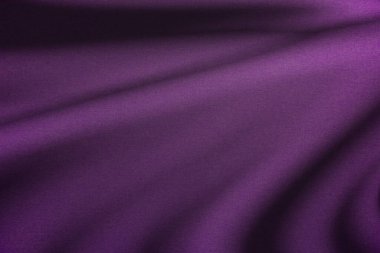 Zarif kıvrımları ve zarif, zarif bir ışıltı efektiyle Derin Kraliyet morunda ipek gibi yumuşak saten bir doku.
