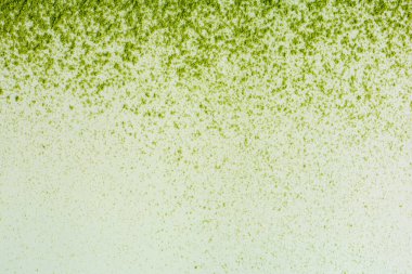 Kibrit tozu, pastel yeşil arka planda izole edilmiş, yüksek kaliteli görüntü.