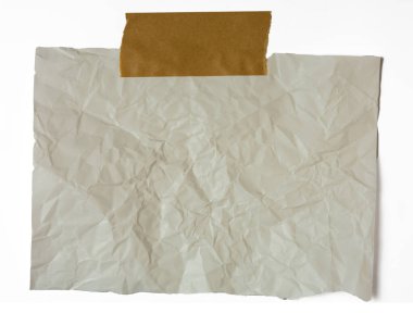 Mesaj yazmak için not kağıdı olarak kullanılan yırtık beyaz kağıt.